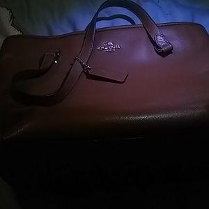 Coach purse .EACH PURCHASE COMES WITH FREE GIFT